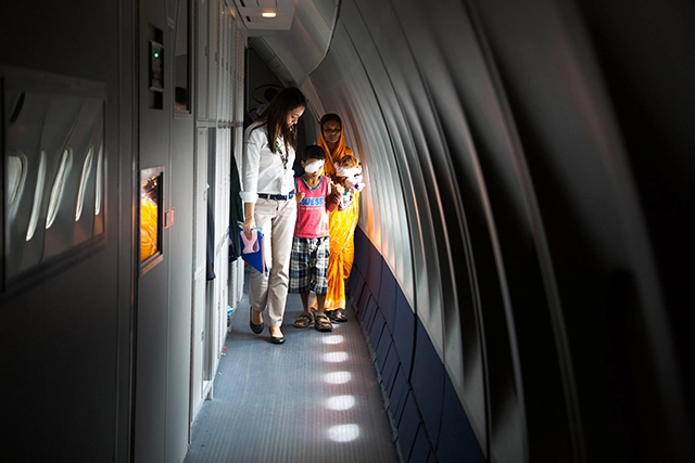 Accompanied by his mother