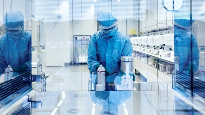 A Cell Processing Specialist at work in Novartis’ new cell and gene production facility in Stein, Switzerland.