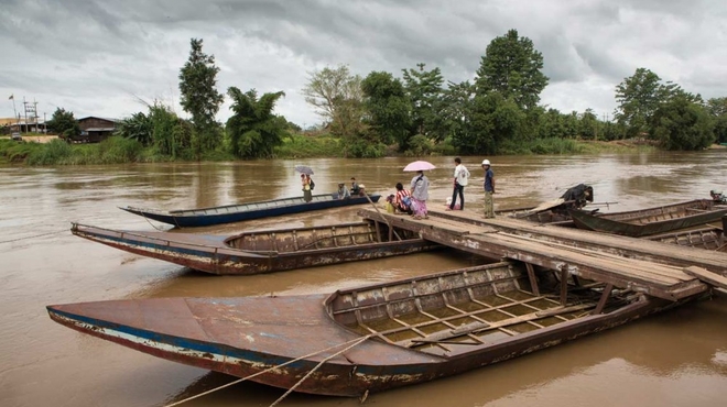 Resistance to artemisinin has been detected in Southeast Asia. Boats on a river on border between Thailand and Burma, where resistance to artemisinin has been detected.