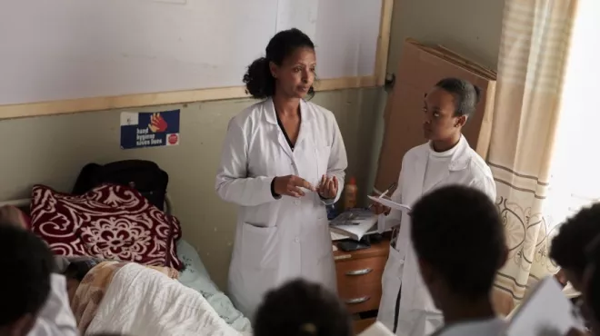 A doctor training young healthcare workers in Ethiopia