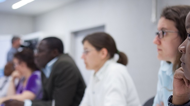 Researcher in a seminar Dr. Thandiswa Ngcungcu listens to a seminar on drug discovery.