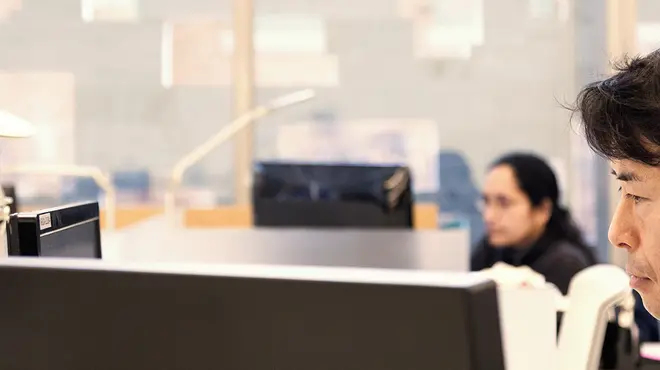 Three data and digital research experts working on computers in a Novartis office. Across Novartis R&D, teams are taking advantage of rapid advances in digital technologies to cut the time it takes to discover and develop drugs for patients while further improving on quality, safety, and the patient experience.