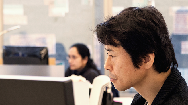 Three data and digital research experts working on computers in a Novartis office. Across Novartis R&D, teams are taking advantage of rapid advances in digital technologies to cut the time it takes to discover and develop drugs for patients while further improving on quality, safety, and the patient experience.