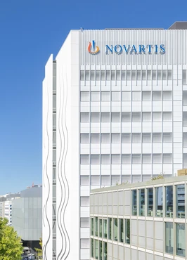 Close up of the Novartis logo on the Banting 1 building, Novartis Campus Basel (vertical)
