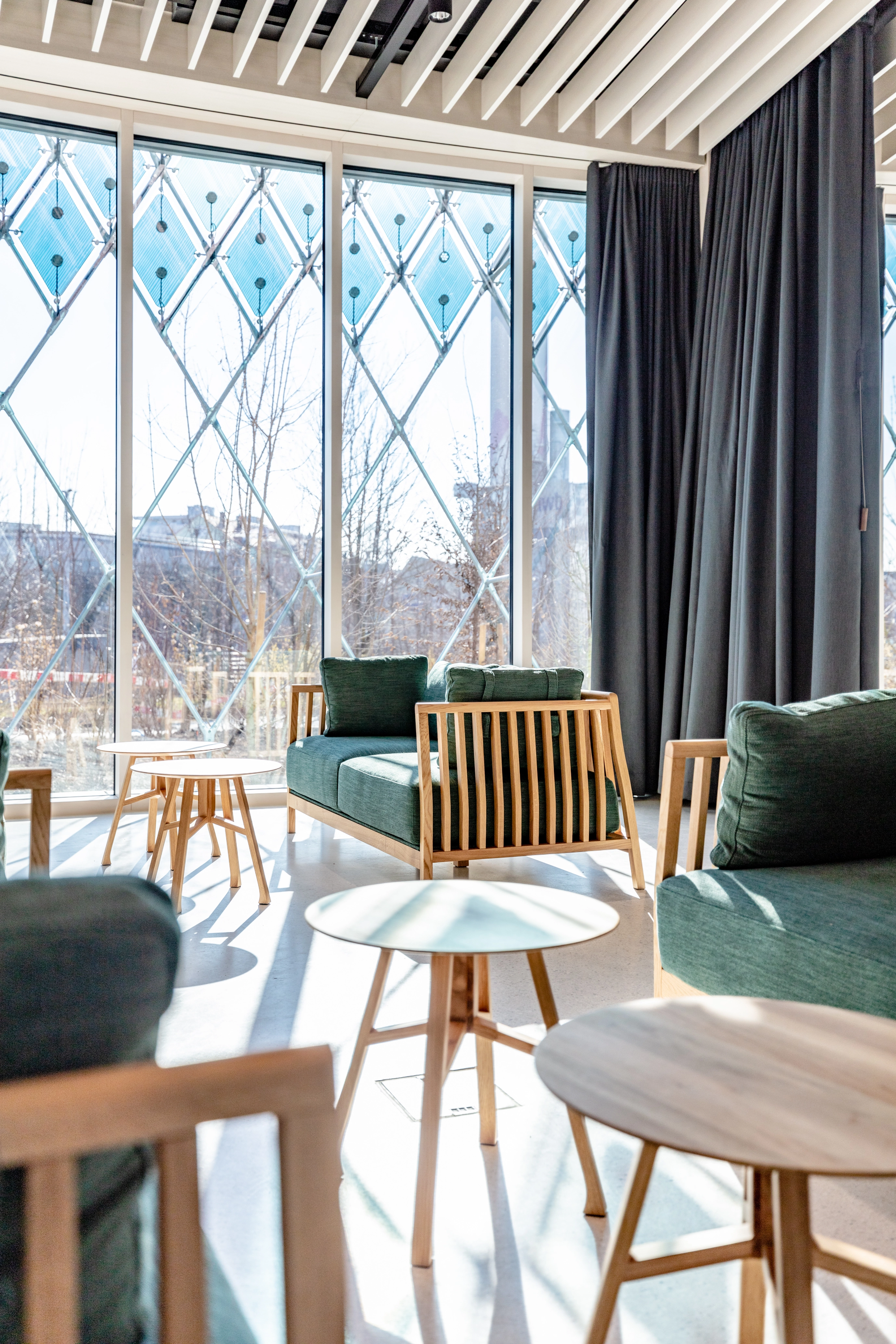 Interior view on the ground floor of the Novartis Pavillon. Lobby set-up in the event space on the ground floor of the Novartis Pavillon.