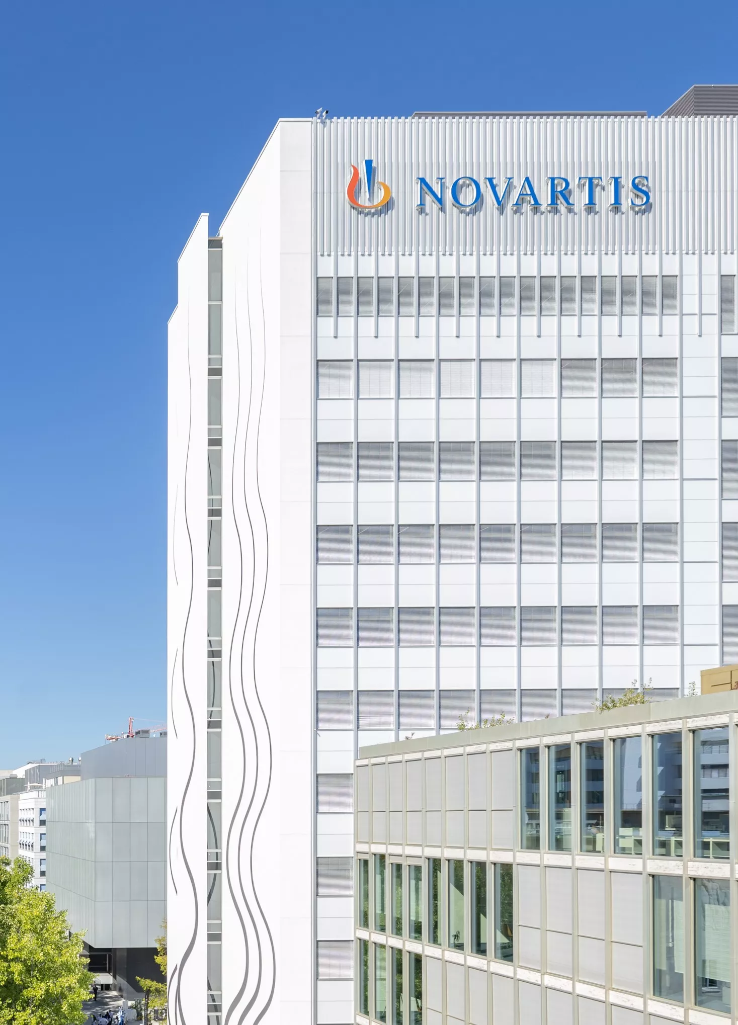 Close up of the Novartis logo on the Banting 1 building, Novartis Campus Basel (vertical)
