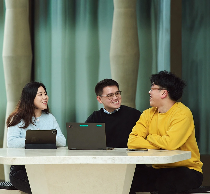 Three business people talking