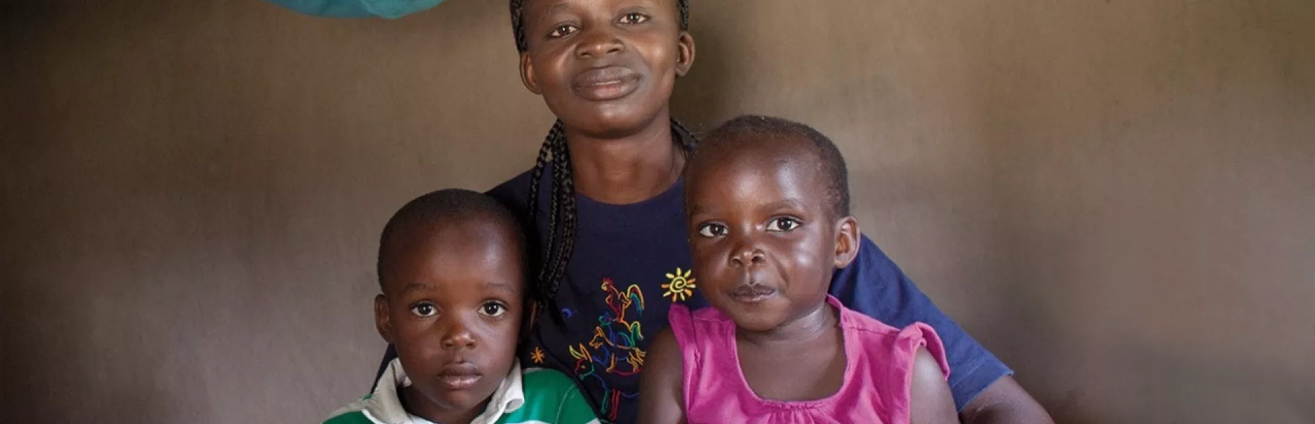 Young African family lives every day with the threat of malaria