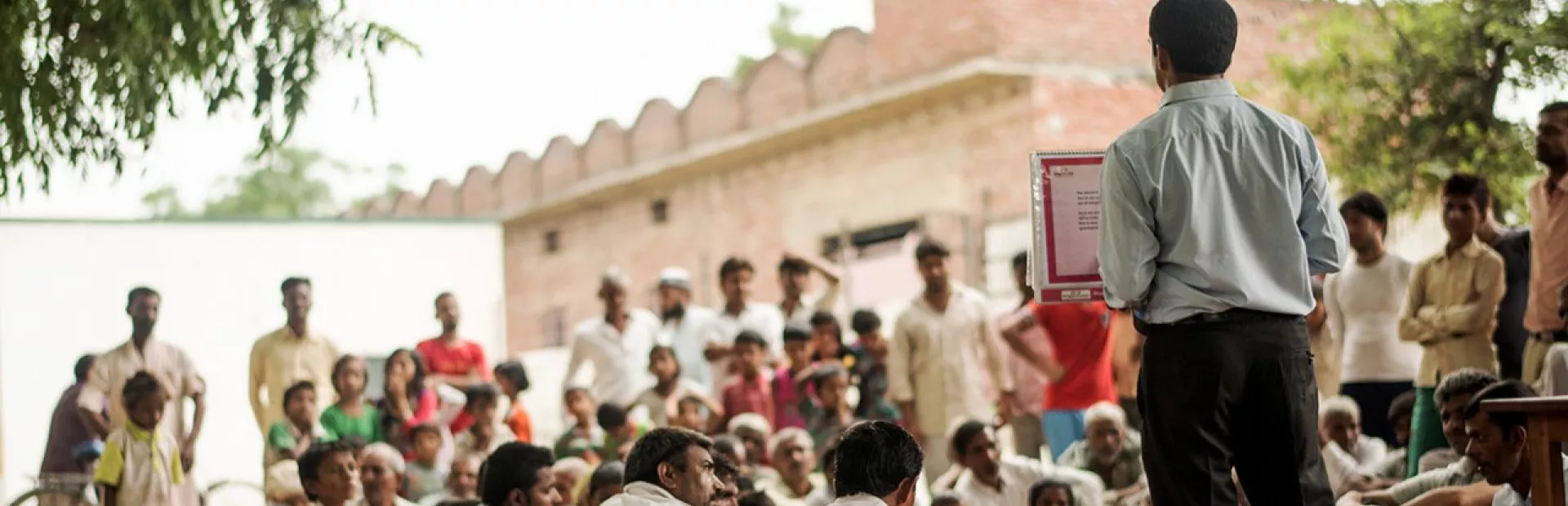 Health educator Chankey Kumar addresses people in the northern Indian village of Mulehra