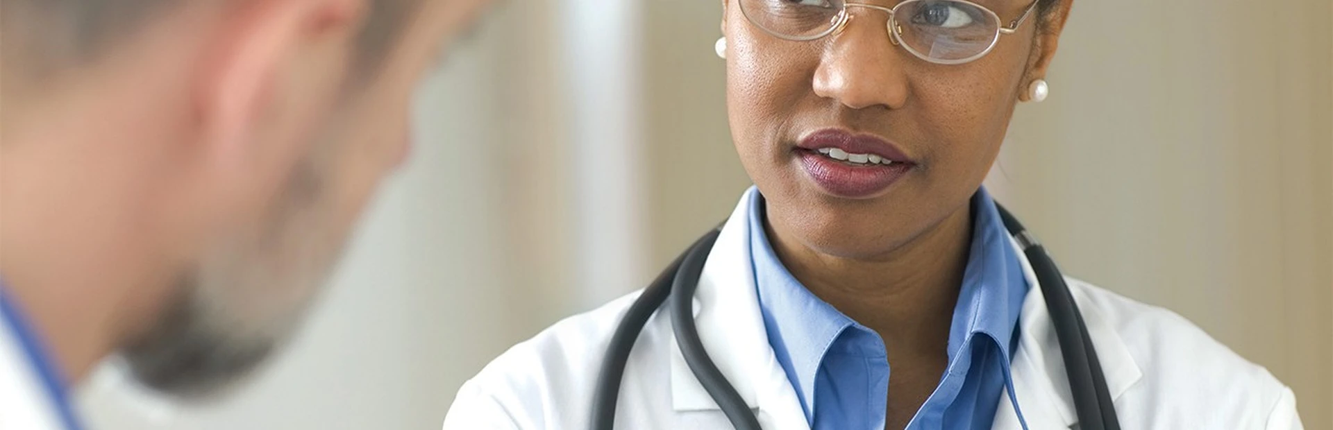 Doctor talking to patient