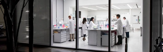 Scientists working in a lab at night