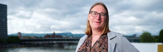 A portrait of Stephie, Global Head of diversity, equity, and inclusion, responsible for disability equity at Novartis