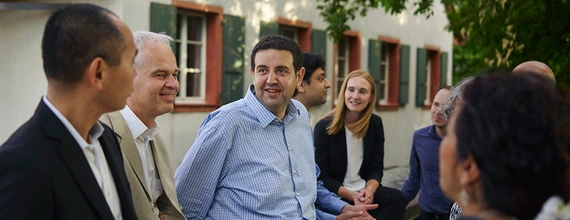 Group of people discussing in the street