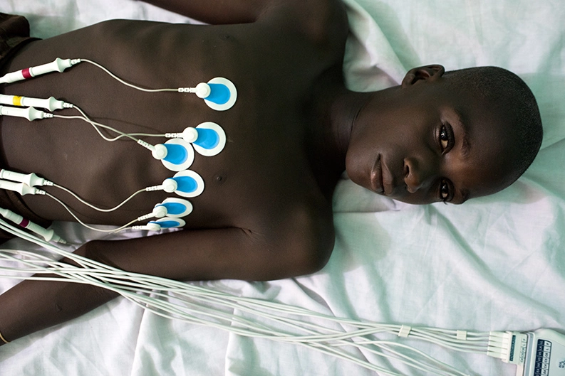 A trial participant undergoes a checkup at the Bougoula-Hameau health clinic