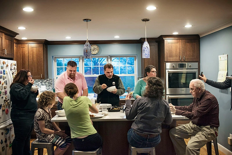 Jennifer's family eating around a table