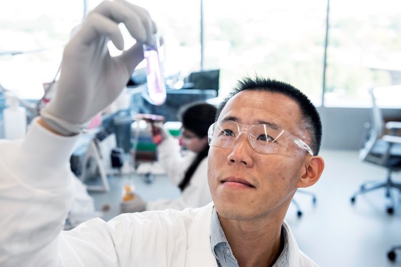 Novartis biologist checking on samples