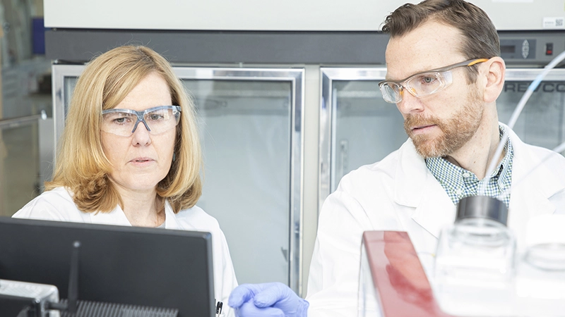 Researchers work in an ophthalmology lab at Novartis.