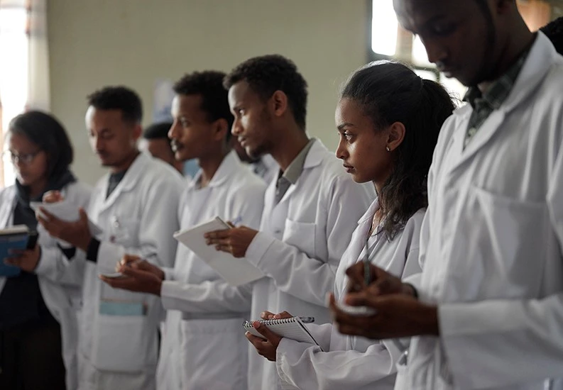 Trainees participate in a class on diagnosing and treating patients with the chronic illness diabetes.