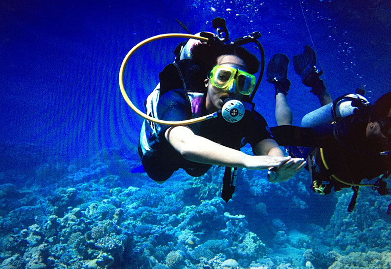 Charlotte Curtis scuba diving