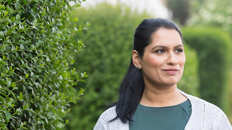 Kidney disease patient walks to her appointment with her doctor