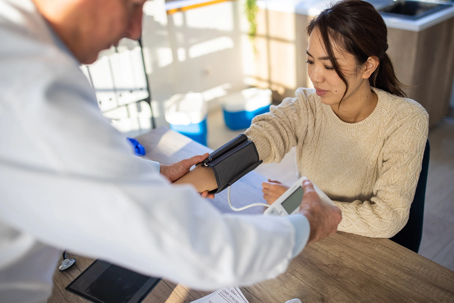 Doctor diagnosing a patient