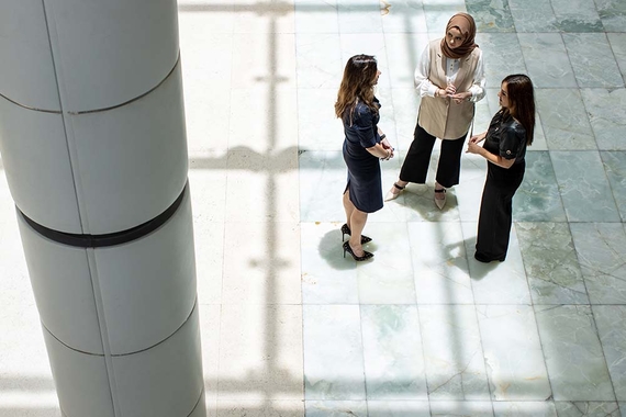 Three business women discussing