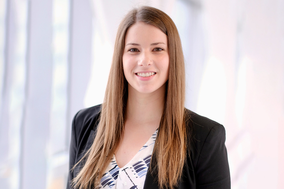 Portrait of Janelle Rychlick, a US-based associate