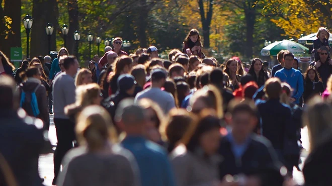 Crowd walking outdoors