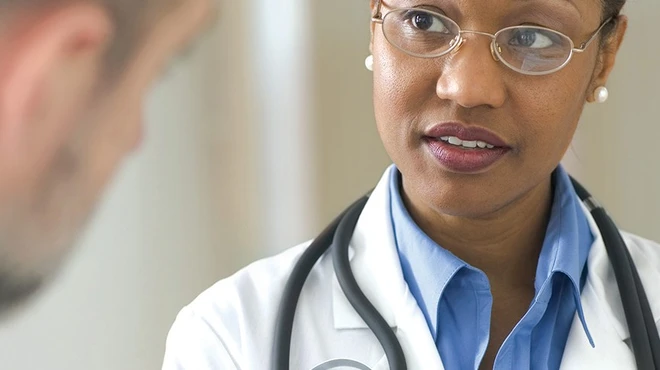 Doctor talking to patient