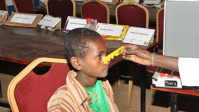 Teenager getting eyes tested