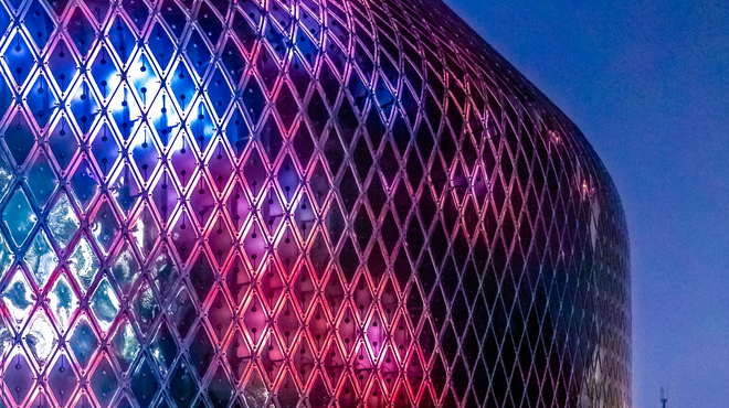 Illumination of zero-energy media facade of the Novartis Pavillon.