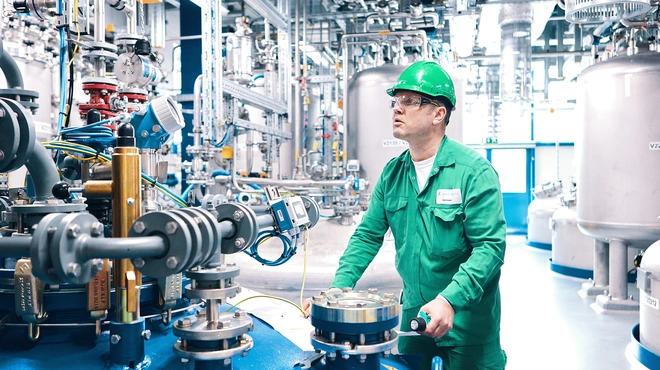 Production specialist working on the production process of RNA therapies in Schweizerhalle, Switzerland