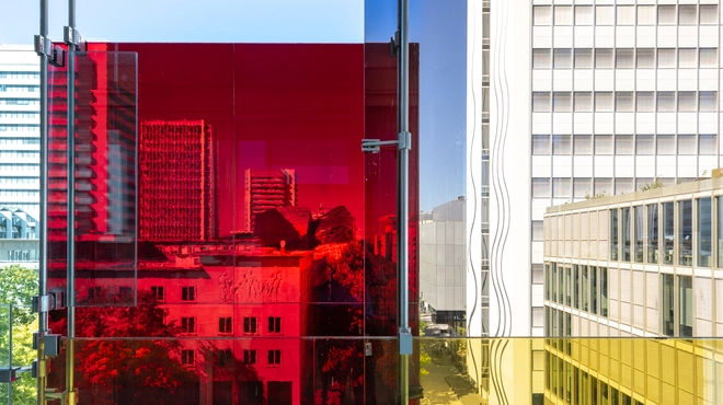 View of the Novartis logo through the colorful façade of Forum 3, Novartis Campus Basel (vertical)