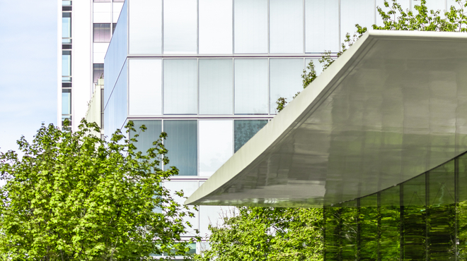 View of the Novartis logo on the Banting 1 building from the main gate, Novartis Campus Basel (vertical)