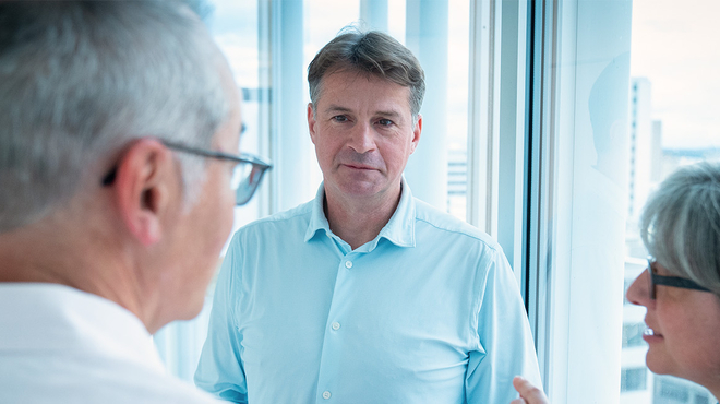 Thomas Severin discussing in a meeting room