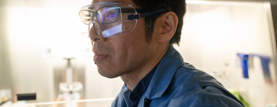 Person working in a laboratory or technical environment