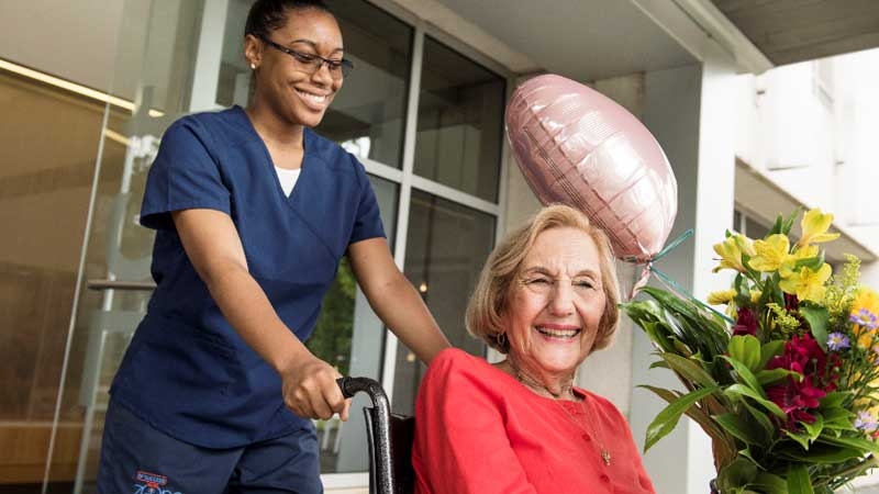 older woman and nurse