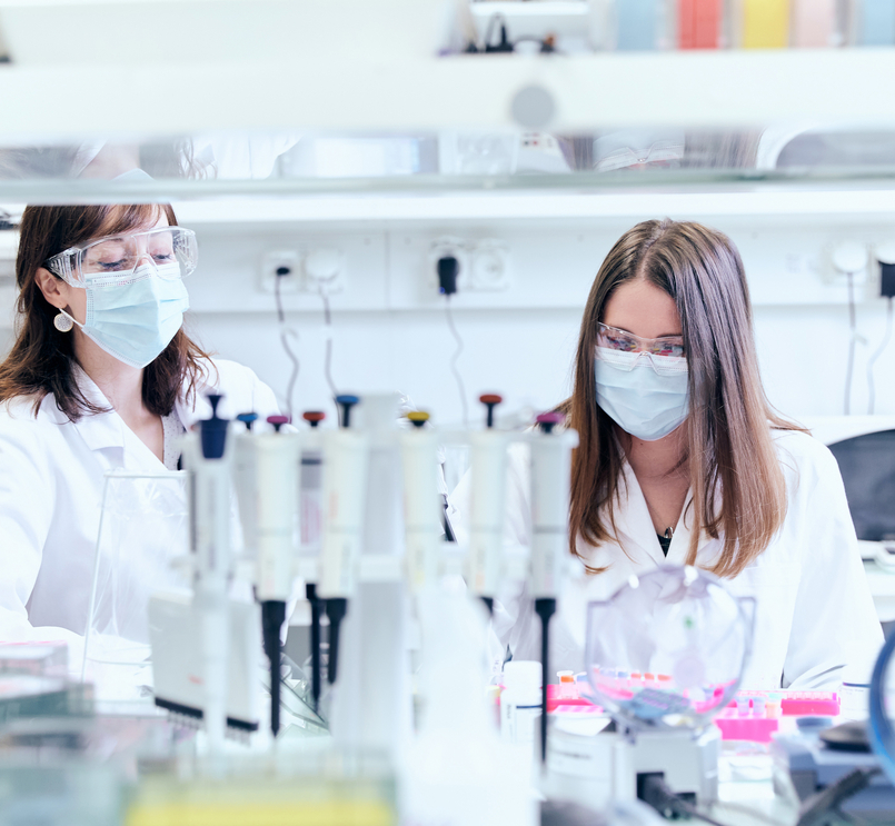 Scientists conducting innovative research experiments in lab