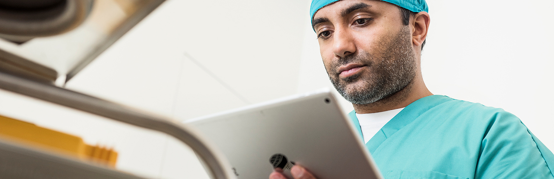 Doctor looking at ipad