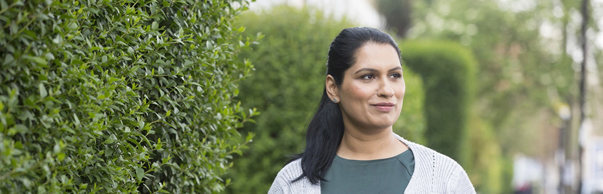Patient portrayal: Woman walking down the street