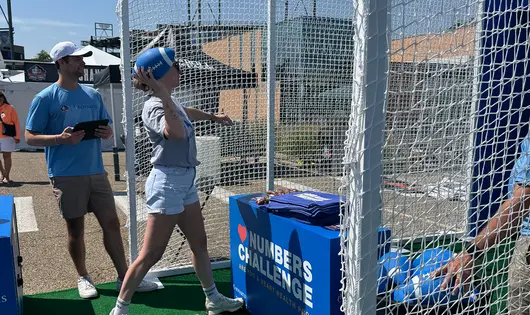 Participant shows her football skills at the Numbers Challenge