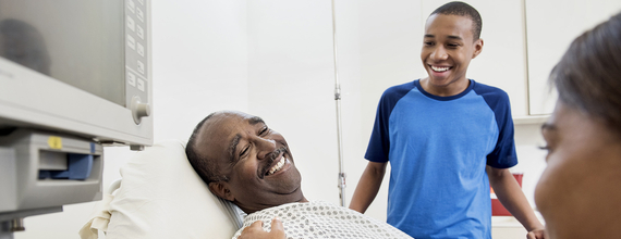 Black Patient and Son at Health Check