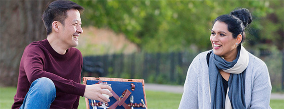 People eating in park