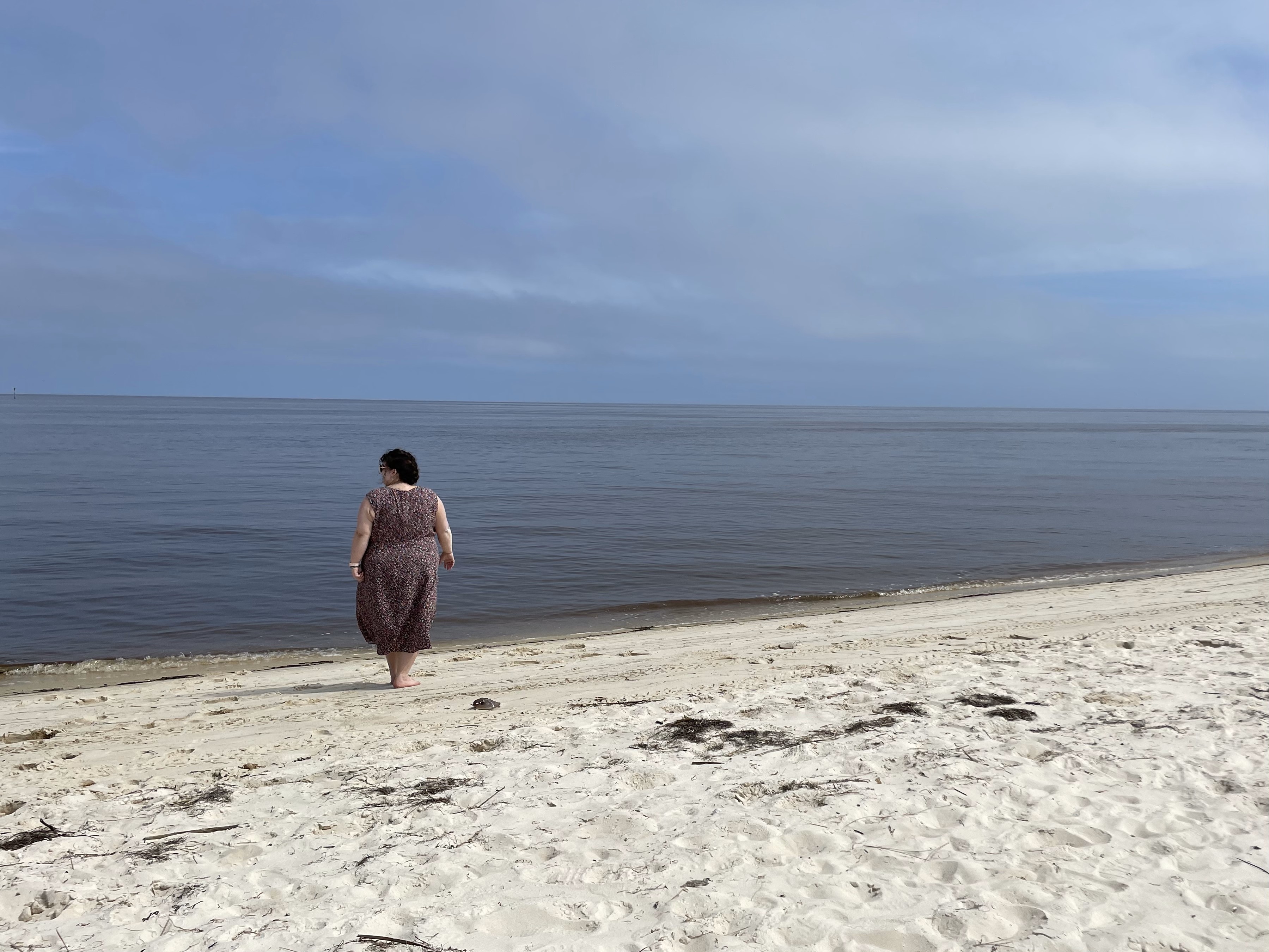 Katy walking on the beach