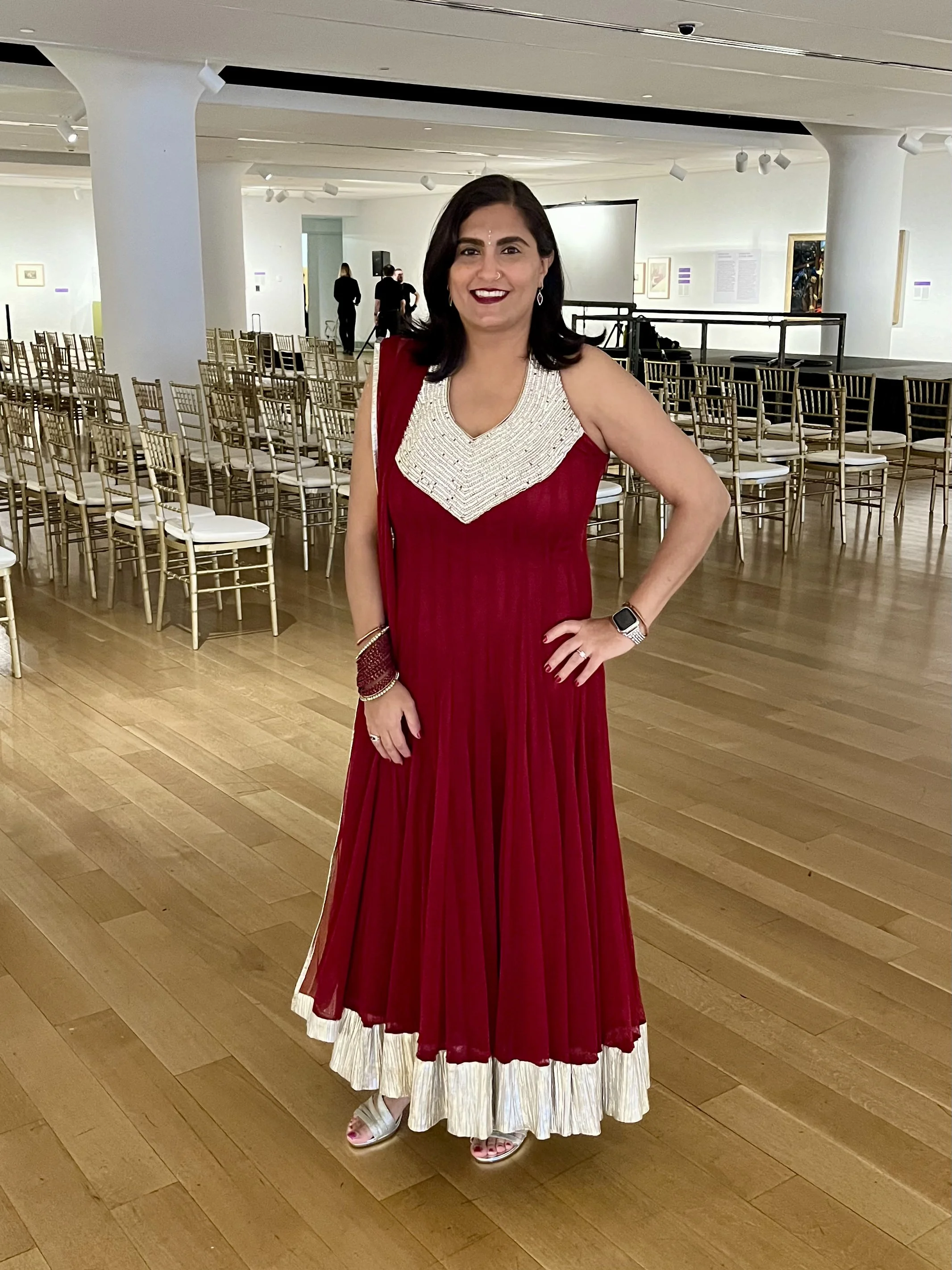 Tina in a multicolored saree at a wedding