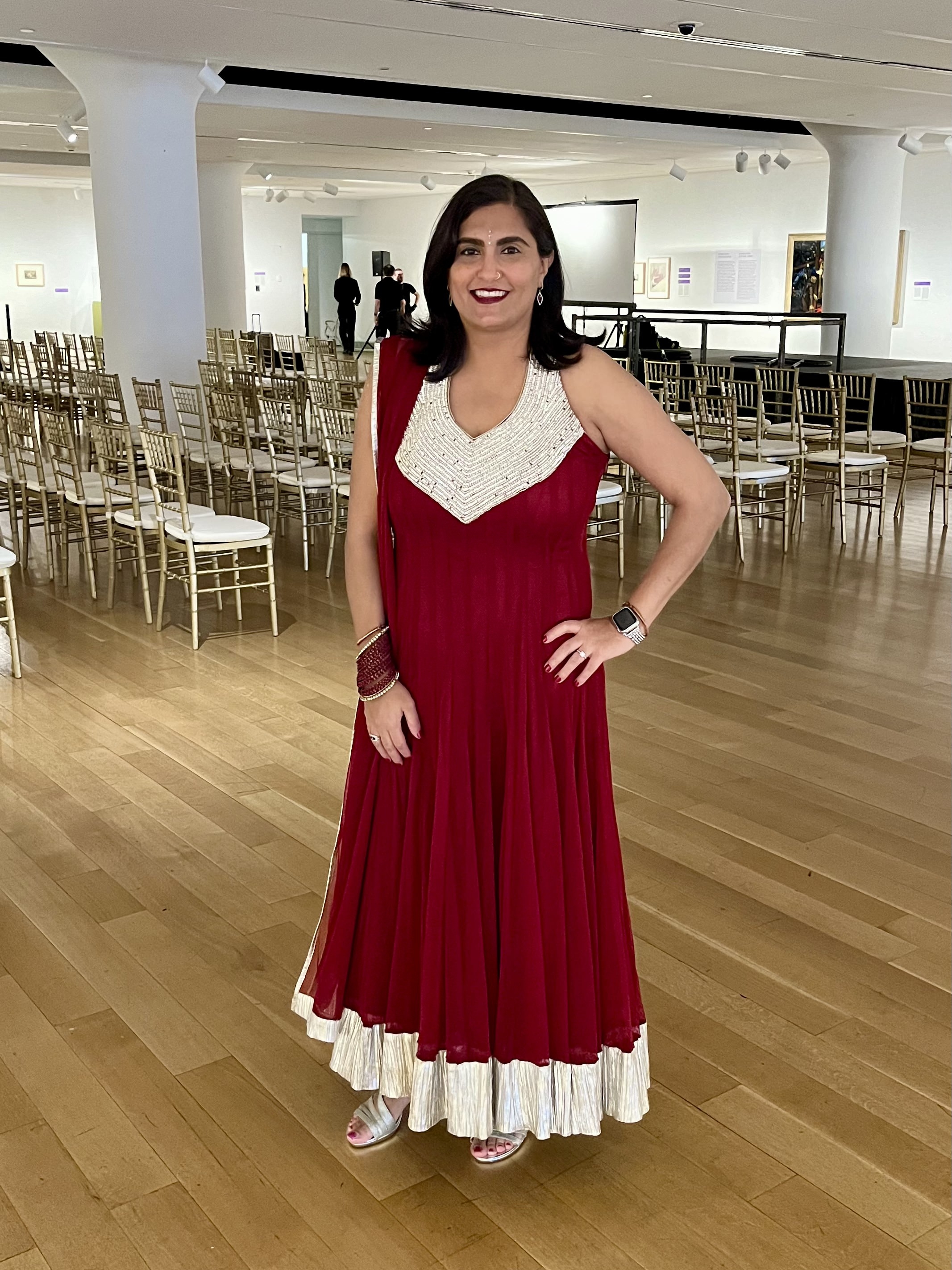 Tina in a multicolored saree at a wedding