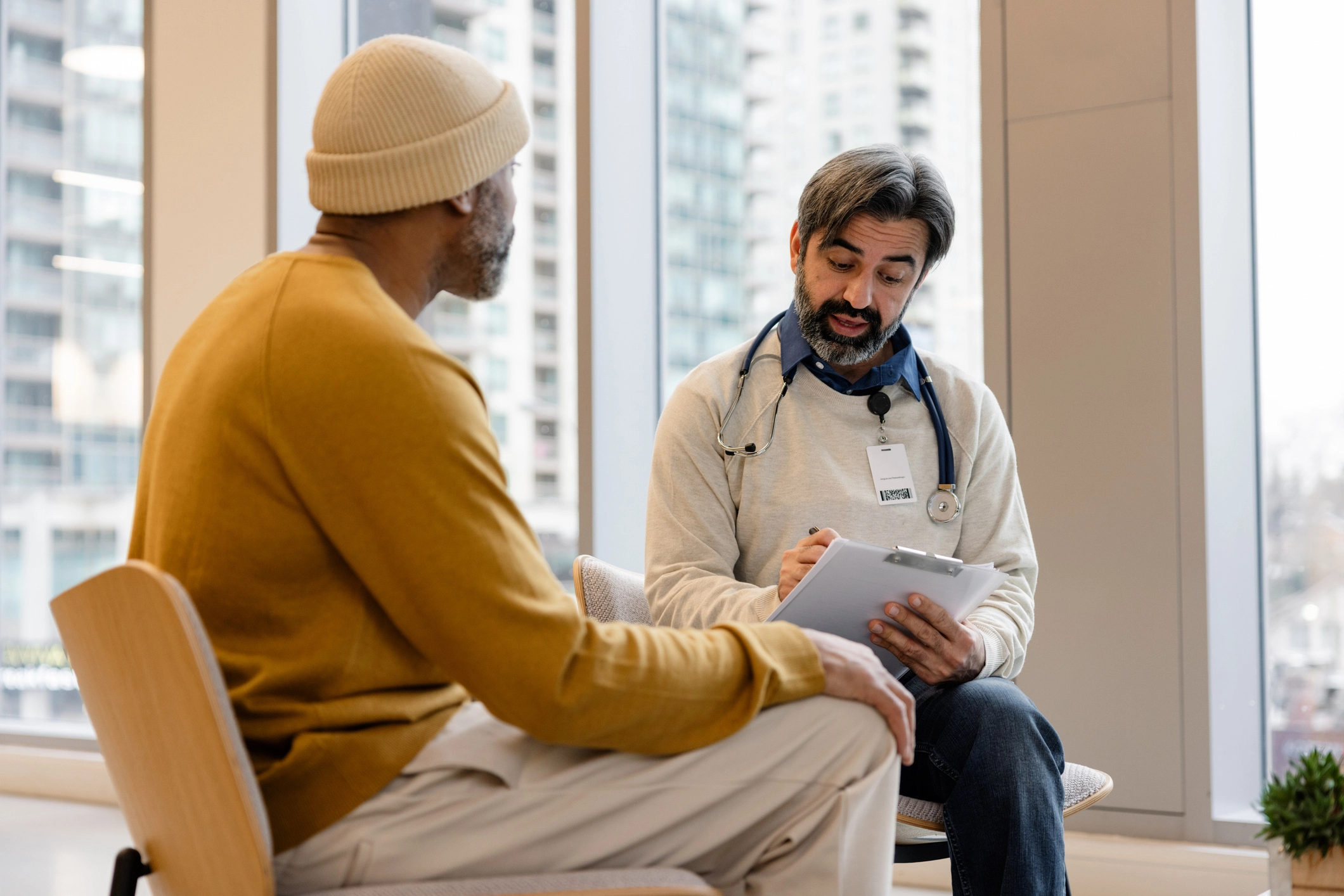 Doctor Having A Consultation With A Patient In His Office