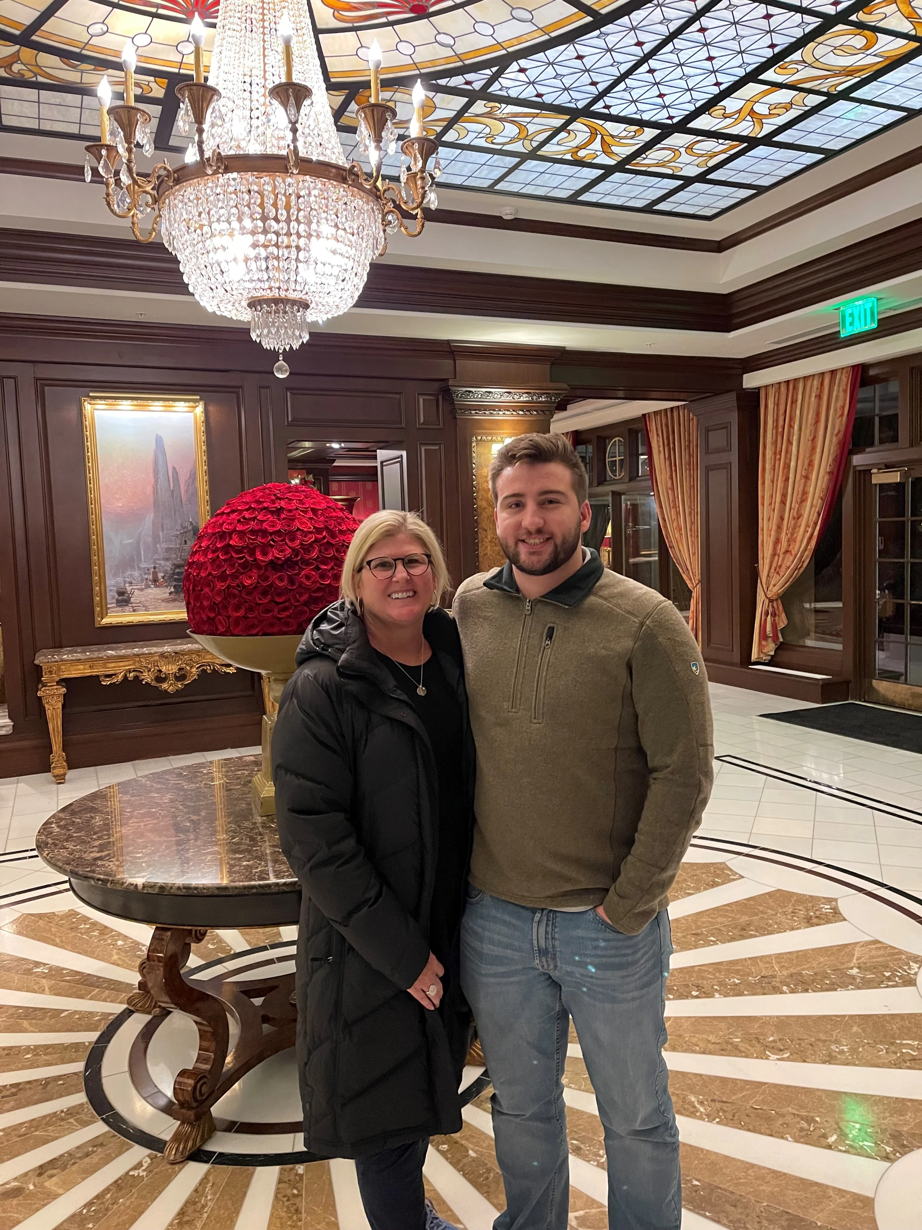 Carter Jaynes, RLT Production Manager at Novartis, who delivers doses of RLT to cancer patients, with his mom, a cancer survivor.