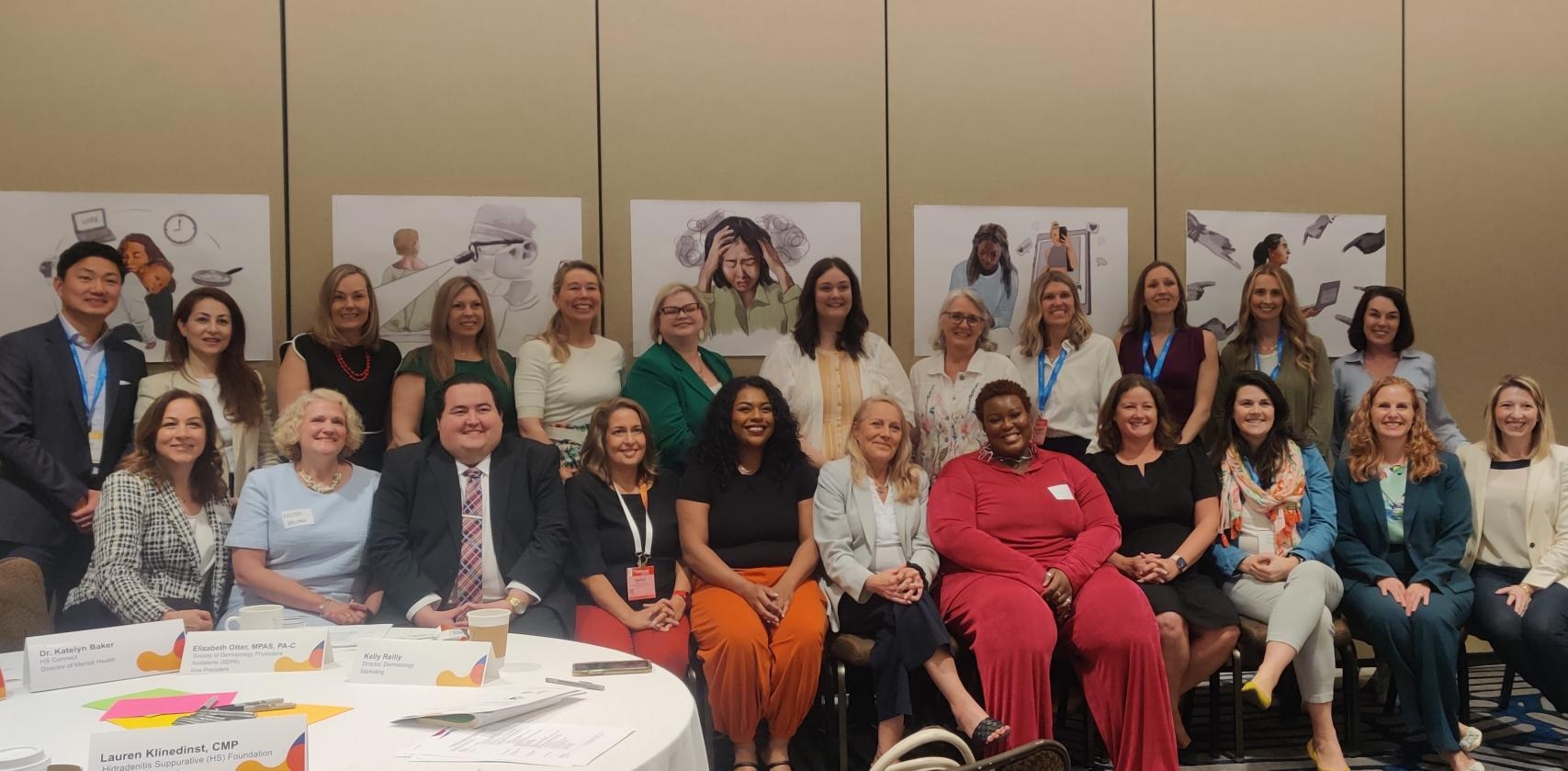 Novartis Immunology team with patient advocates during the 2025 AAD Annual Meeting. 