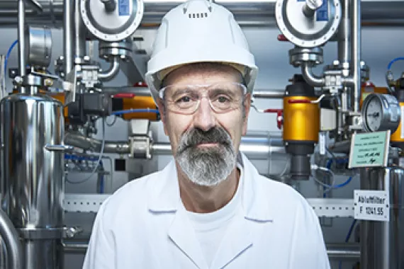 A Novartis scientist in a manufacturing plant